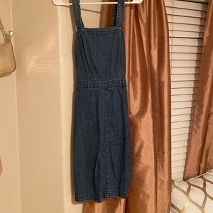 long jean dress with cross straps in the back